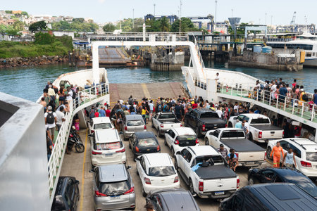 Salvador, Bahia, Brazil - September 11, 2022: Passengers and cars waiting to disembark from the ferry boat after sea crossing. Salvador, Bahiaのeditorial素材