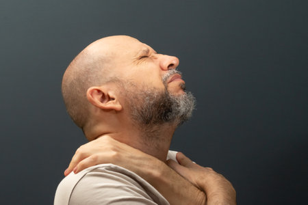 Man in his 50s, emotionally shaken showing stress or pain gesture. Feeling weak or depressed....