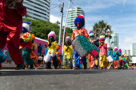Salvador, Bahia, Brazil - February 11, 2023: Low view of the Zambiapunga cultural group parading in...