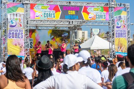 Salvador, Bahia, Brazil - August 23, 2015: People on a stage warming up with dancing before the...