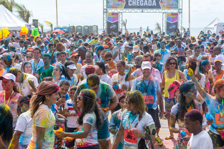 Salvador, Bahia, Brazil - August 23, 2015: Hundreds of people are seen enjoying themselves during...