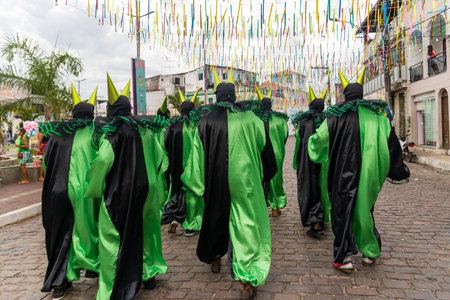 Maragogipe, Bahia, Brazil - February 20, 2023: Group of people are seen dressed in Venetian style...