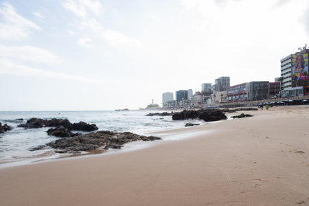 Salvador, Bahia, Brazil - August 25, 2023: View of the sea and Farol da Barra, postcard of the city of Salvador, Bahia.のeditorial素材