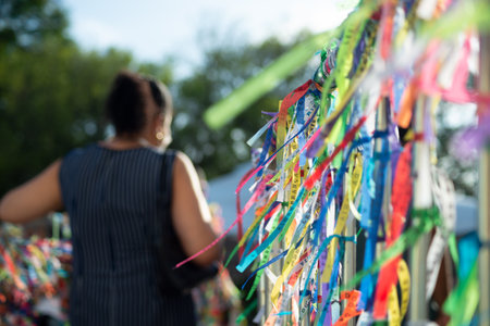 Salvador, Bahia, Brazil - January 07, 2022: Catholic faithful are seen arriving and leaving the Senhor do Bonfim church in the city of Salvador, Bahia.のeditorial素材