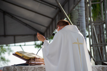 Salvador, Bahia, Brazil - January 07, 2022: Catholic priest is seen celebrating mass in honor of the first Friday of the year 2022 at the Senhor do Bonfim church in Salvador, BAhia.のeditorial素材