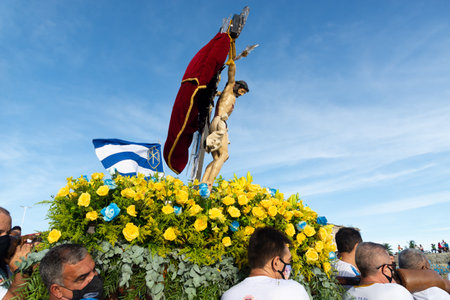 Salvador, Bahia, Brazil - December 31, 2021: Statue of Jesus Christ, the lord of sailors, being taken to the Galiota boat on Boa Viagem beach, in the city of Salvador, Bahia.のeditorial素材