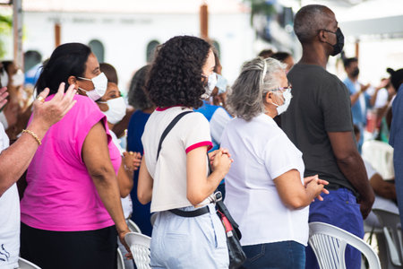 Salvador, Bahia, Brazil - January 07, 2022: Catholic faithful are seen during the mass in honor of the first Friday of 2022 at the Senhor do Bonfim church in Salvador, Bahia.のeditorial素材
