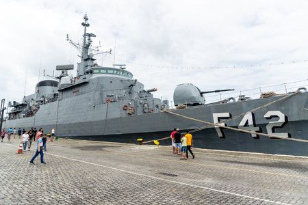 Salvador, Bahia, Brazil - October 08, 2023: People and tourists are visiting the Brazilian Navy ship Fragata Constituicao F42, docked at the seaport of the city of Salvador, Bahia.のeditorial素材