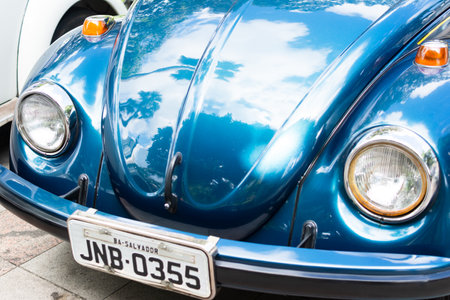 Salvador, Bahia, Brazil - November 1, 2014: Front view of a blue Volkswagen Beetle model on display in the city of Salvador, Bahia.のeditorial素材
