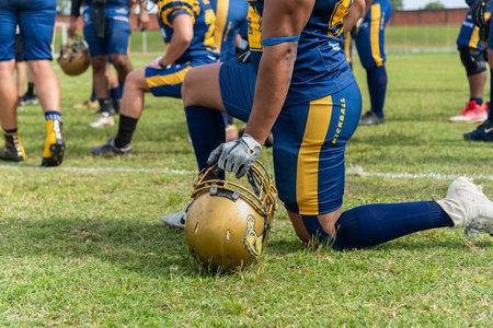 Camacari, Bahia, Brazil - September 30, 2023: American football players are seen watching the game at the Armando Oliveira stadium, in CamaÃ§ari, Bahia.のeditorial素材