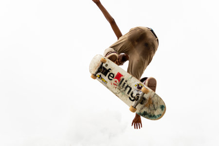 Salvador, Bahia, Brazil - March 14, 2020: Skateboarder is seen doing risky maneuvers at Parque dos Ventos in the city of Salvador, Bahia.のeditorial素材