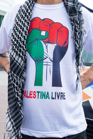 Salvador, Bahia, Brazil - November 11, 2023: Protester with a shirt reading Free Palestine is seen at the Barra lighthouse in the city of Salvador, Bahia.のeditorial素材