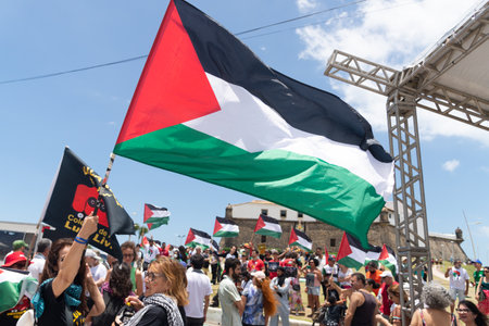 Salvador, Bahia, Brazil - November 11, 2023: Protesters are holding a Palestinian flag during a...