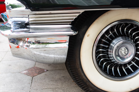 Salvador, Bahia, Brazil - November 1, 2014: Detail of the front wheel of a car at an exhibition of vintage cars in the city of Salvador, Bahia.のeditorial素材