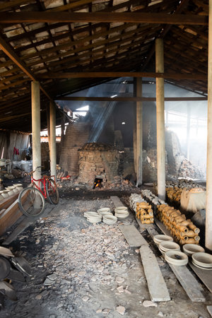 Aratuipe, Bahia, Brazil - May 30, 2015: Internal view of a pottery with a wood-fired oven in Maragogipinho in the city of Aratuipe, Bahia.のeditorial素材