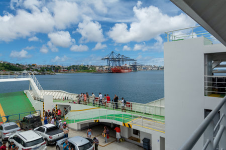 Salvador, Bahia, Brazil - March 12, 2023: Ferry boat arriving at the Sao Joaquim maritime terminal in the city of Salvador, Bahia.のeditorial素材