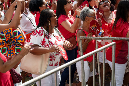 Salvador, Bahia, Brazil - December 04, 2023: Catholic and Camdoble faithful are seen during an open mass in honor of Santa Barbara in Pelourinho, city of Salvador, Bahia.のeditorial素材