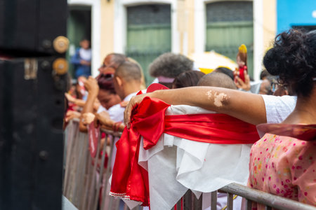 Salvador, Bahia, Brazil - December 04, 2023: Catholic and Camdoble faithful are seen during an open mass in honor of Santa Barbara in Pelourinho, city of Salvador, Bahia.のeditorial素材