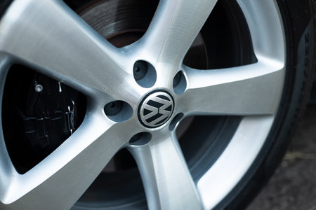 Salvador, Bahia, Brazil - December 02, 2023: Detail of the logo on the wheel of an old Volkswagen car. City of Salvador, Bahia.のeditorial素材