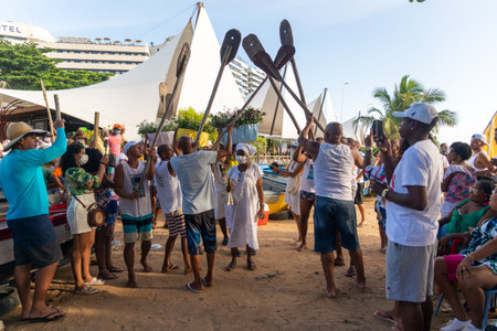Salvador, Bahia, Brazil - January 30, 2022: fishermen and members of candomble are seen carrying gifts for iemanja in the city of salvador, bahia.のeditorial素材