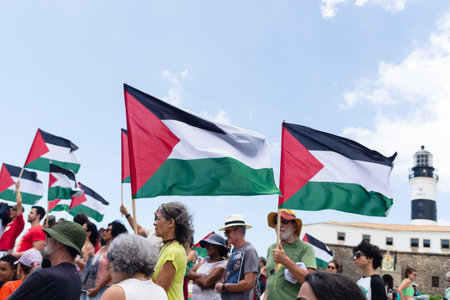 Salvador, Bahia, Brazil - November 11, 2023: Protesters are seen holding the Palestinian flag during a peaceful protest in the city of Salvador, Bahia.のeditorial素材