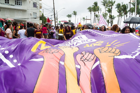 Salvador, Bahia, Brazil - March 08, 2020: Activists protest during the Women Day march in the city of Salvador, Bahia.のeditorial素材