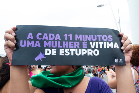 Salvador, Bahia, Brazil - March 08, 2020: Protesters are seen on Women Day protesting against machismo. City of Salvador, Bahia.のeditorial素材