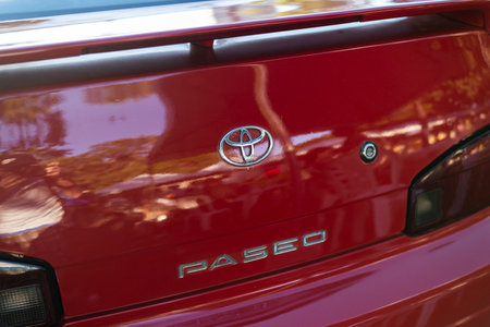 Salvador, Bahia, Brazil - December 02, 2023: Detail of the logo of a Toyota car. City of Salvador, Bahia.のeditorial素材