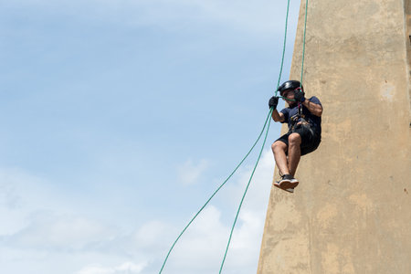 Rappelist descending from a great height. Healthy and dangerous sport. Lifestyle.