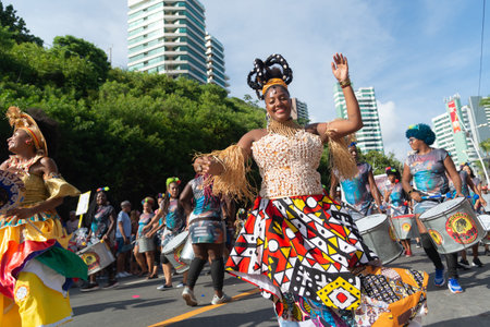 Salvador, Bahia, Brazil - February 03, 2024: Cultural group is parading during the Fuzue pre-carnival in the city of Salvador, Bahia.のeditorial素材
