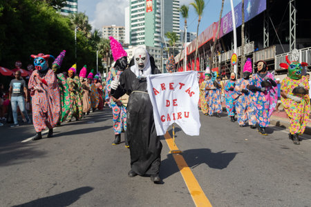Salvador, Bahia, Brazil - February 03, 2024: Cultural group is parading during the Fuzue pre-carnival in the city of Salvador, Bahia.のeditorial素材