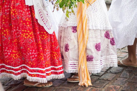 Maragogipe, Bahia, Brazil - February 11, 2024: People dressed in clothes from the Candomble religion are seen during the carnival in the city of Maragogipe, in Bahia.のeditorial素材