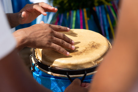 Percussionist hands playing atabaque. Tribute to Iemanja.の写真素材