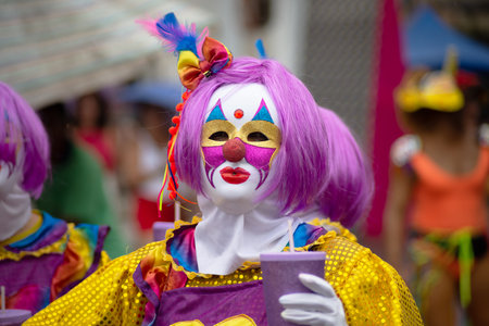 Maragogipe, Bahia, Brazil - February 11, 2024: People masked in different styles are seen playing during the carnival in the city of Maragogipe, Bahia.のeditorial素材