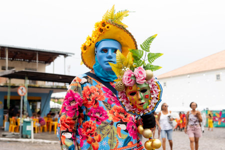 Maragogipe, Bahia, Brazil - February 11, 2024: Masked people are seen having fun during carnival in the city of Maragogipe in Bahia.のeditorial素材