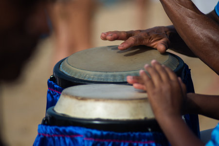 Hands playing atabaque. musical rhythm. African music. Tribute to Iemanja.の写真素材