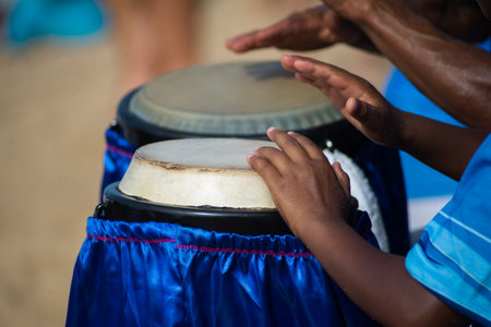 Hands playing atabaque. musical rhythm. African music. Tribute to Iemanja.の写真素材