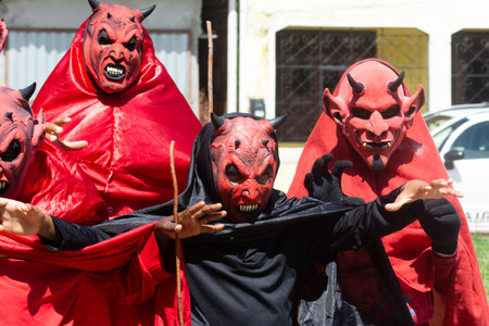 Santo Amaro, Bahia, Brazil - July 27, 2015: People are seen wearing horror costumes and masks in the Acupe neighborhood, in the city of Santo Amaro, Bahia.のeditorial素材