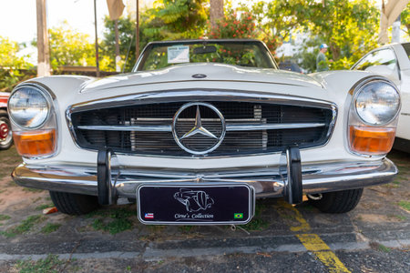 Salvador, Bahia, Brazil - December 02, 2023: A vintage Mercedes SL 280 car on display at a vintage...