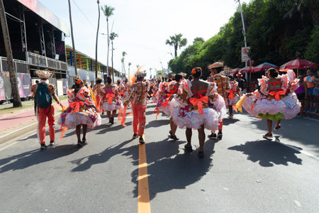 Salvador, Bahia, Brazil - February 03, 2024: Cultural groups are seen dancing during the Fuzue pre-carnival parade in the city of Salvador, Bahia.のeditorial素材