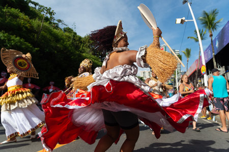 Salvador, Bahia, Brazil - February 03, 2024: Cultural group is parading during the Fuzue pre-carnival in the city of Salvador, Bahia.のeditorial素材