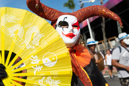 Salvador, Bahia, Brazil - February 03, 2024: Cultural group dressed in Venice Carnival style is seen parading during Fuzue in the city of Salvador, Bahia.のeditorial素材