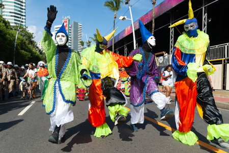 Salvador, Bahia, Brazil - February 03, 2024: People dressed in Venice Carnival style are seen parading during Fuzue in the city of Salvador, Bahia.のeditorial素材