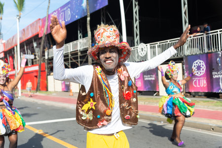 Salvador, Bahia, Brazil - February 03, 2024: Cultural group is parading during the Fuzue pre-carnival in the city of Salvador, Bahia.のeditorial素材