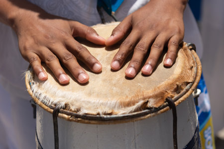 Percussionist's hands resting on top of the atabaque. African music.の写真素材