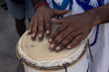 Hands playing atabaque. African music. Percussion instrument.の写真素材