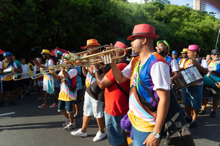 Salvador, Bahia, Brazil - February 03, 2024: Musicians are seen playing wind instruments during Fuzue, pre carnival in the city of Salvador, Bahia.のeditorial素材