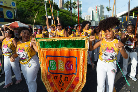 Salvador, Bahia, Brazil - February 03, 2024: People who are members of cultural groups are seen parading during Fuzue, pre-carnival in the city of Salvador, Bahia.のeditorial素材