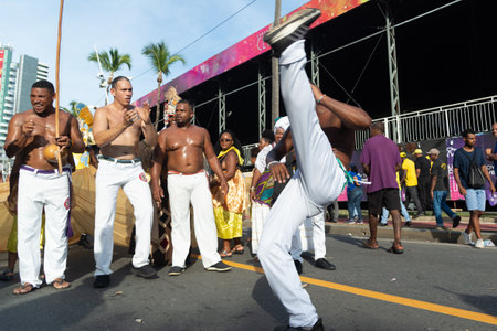 Salvador, Bahia, Brazil - February 03, 2024: Cultural group of Capoeiristas is seen during Fuzue, pre carnival in the city of Salvador, Bahia.のeditorial素材