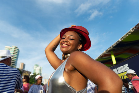 Salvador, Bahia, Brazil - February 03, 2024: People who are members of cultural groups are seen parading during Fuzue, pre-carnival in the city of Salvador, Bahia.のeditorial素材